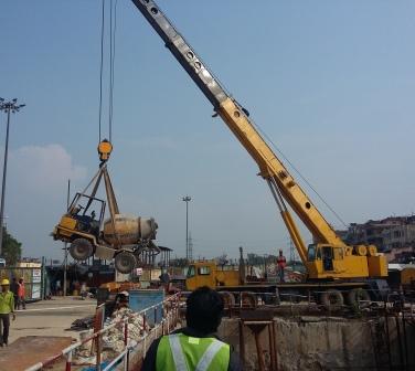 2 Cubic Meter Self Loading Transit Mixer (2 cu. mtr. SLTM) being lowered in tunnel for DMRC Project